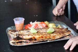 Festa da Tainha,Estaleiro,Balneário Camboriú,13ª edição,60 anos de Balneário Camboriú,Rodovia Interpraias,Rua Domingos Fonseca,Praia do Estaleiro,Prefeitura,Fundação Cultural e Associação dos Moradores do Estaleiro,Banda Municipal,Banda Maria do Cais,Grupo Legião Gaúcha,DJ Jorgemar,Susi Brito,Choro e Samba,Julia Mattos,Duo Filho de Peixe