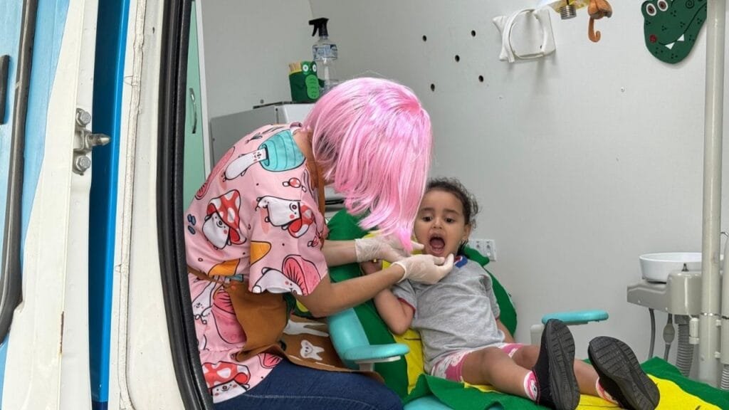 Odontomóvel Penha,saúde bucal infantil,atendimento odontológico escolar