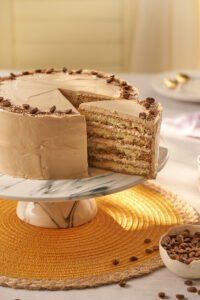 Dia Mundial do Café receitas,bolo moka receita,rocambole de café receita,sobremesas com café,gastronomia café Brasil,receitas com café fáceis,bolo de café cremoso,rocambole recheado chocolate café,como fazer bolo moka,receitas doces com café,café culinária brasileira,sobremesas especiais café,receitas para Dia do Café,preparo de bolo moka,receitas com café solúvel,doces gourmet com café