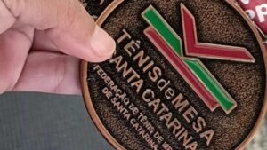 Navegantes,tênis de mesa,Circuito Catarinense de Tênis de Mesa,atletas de Navegantes,esporte em Navegantes,Santa Catarina,Blumenau,Chapecó,Fundação Municipal de Esporte,FME,mesatenistas,competição de tênis de mesa,classificação para próxima fase,medalhas no tênis de mesa,esporte catarinense,circuito estadual de tênis de mesa,delegação de Navegantes,resultados do tênis de mesa